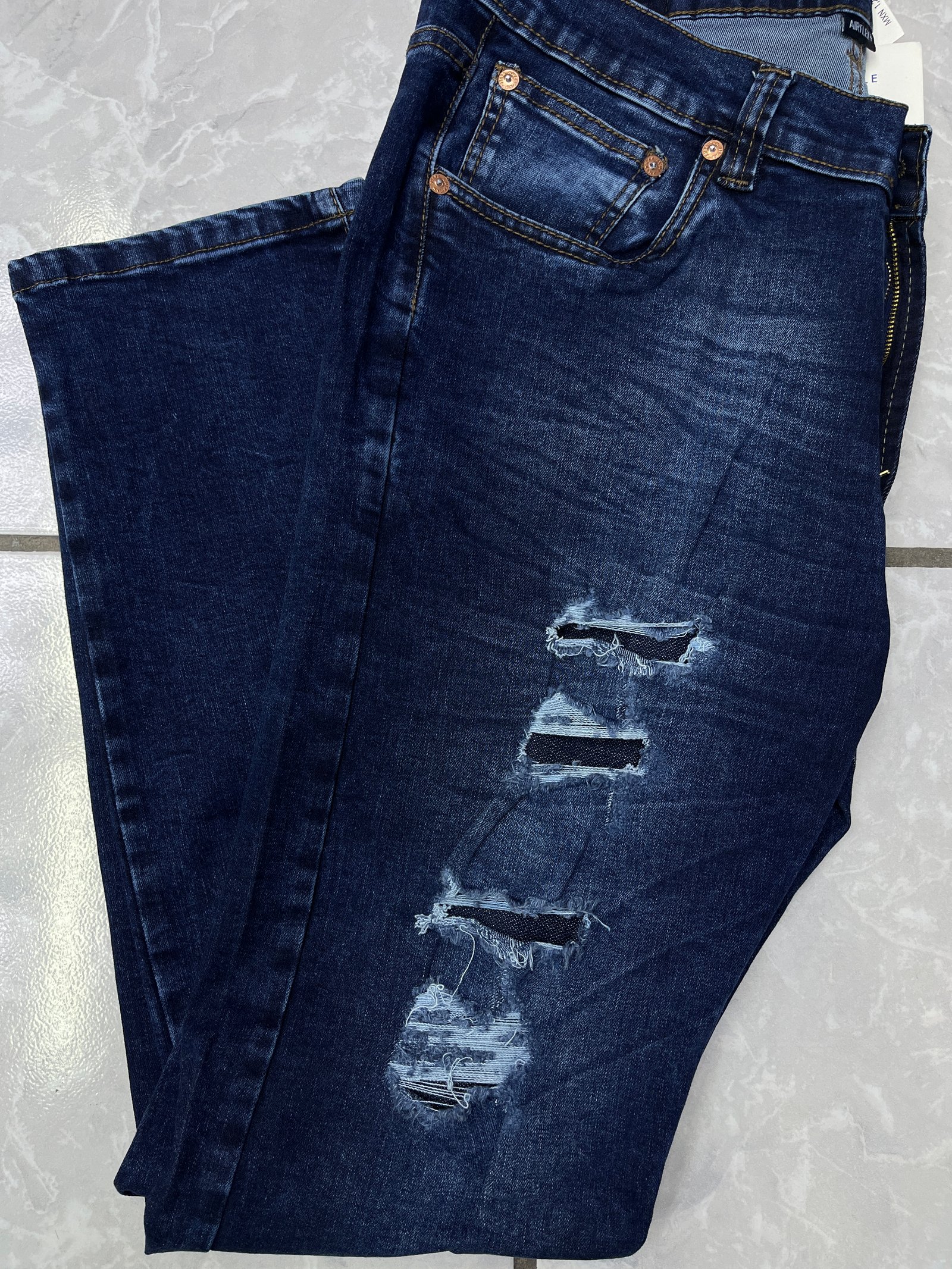 Pantalón Rasgado